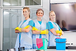 Cleaning brigade working in office photo