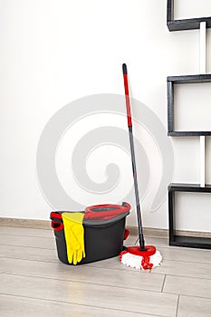 Cleaning Bucket and Yellow Glove