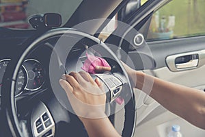 Cleaning car light switch control from the dust .