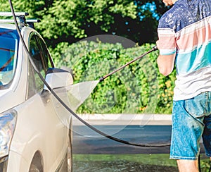 Cleaning car at self car wash