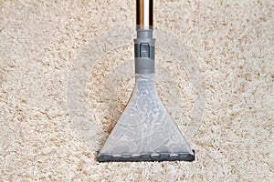 Cleaning carpet by washing hoover