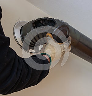 Cleaning the chimney from the inspection door