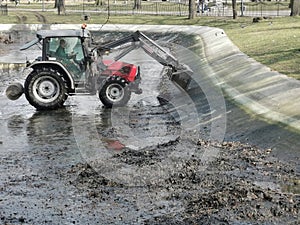 Cleaning the city pond