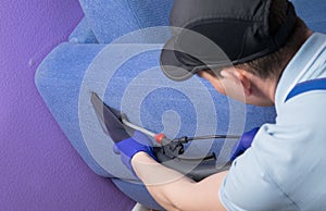 The cleaning company is engaged in cleaning of the apartment and upholstered furniture, full cleaning, a vacuum cleaner with wet photo