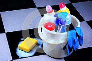 Cleaning of debris with a sponge and soap foam tile floor, sanitary restoration of cleanliness. Maintaining a safe hygiene of