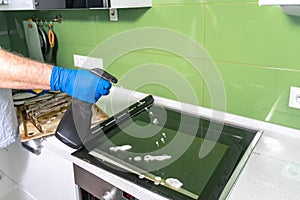 Cleaning a dirty oven in the kitchen