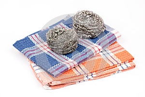 Cleaning dish wire on the kitchen dishtowel