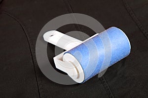 Cleaning dust with lint roller