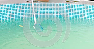 Cleaning frame pool with a skimmer net. Pool maintenance process