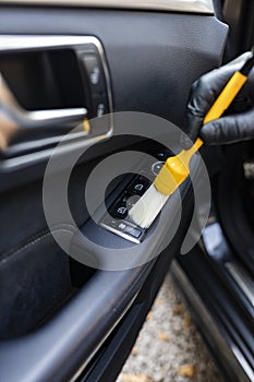 Cleaning gaps in the interior of the vehicle using the brushes listed