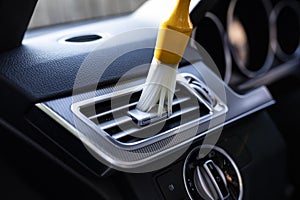 Cleaning gaps in the interior of the vehicle using the brushes listed