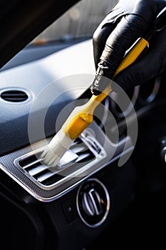 Cleaning gaps in the interior of the vehicle using the brushes listed