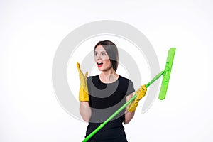 Cleaning girl happy excited during cleaning. Funny girl with cleaning mop isolated on white background