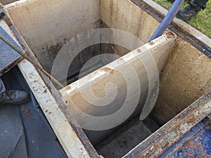 Cleaning grease trap tank to sewage tank at factory
