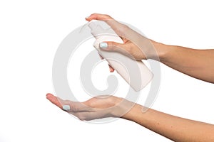 Cleaning, hand holding spray bottles  against white background