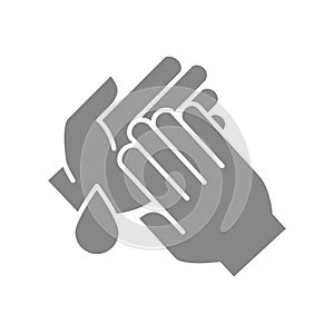 Cleaning hands with disinfectant drop grey icon. Hand disinfection, hygiene symbol