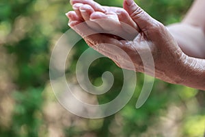 Woman using rubbing alcohol