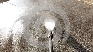 Cleaning with high pressure cleaner, slow motion