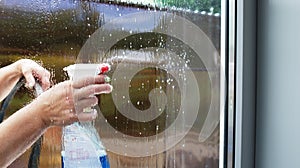 Cleaning home window outside view