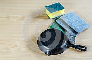 Cleaning items, brushes for clean kitchenware on the wooden background. House higiene, sanitation
