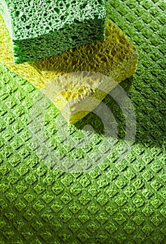 Cleaning kitchen sponges on dishrag