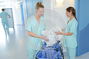 Cleaning ladies doing housekeeping in clinic