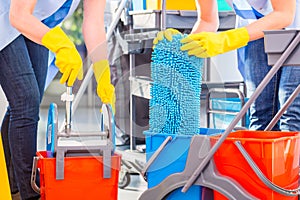 Cleaning ladies mopping floor