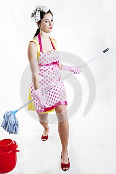 Cleaning lady dreams of playing guitar with the broom handle