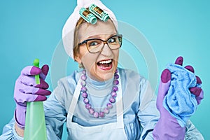 Cleaning Lady Fun. Elderly funny housewife fooling around with a broom. Full body . woman funky