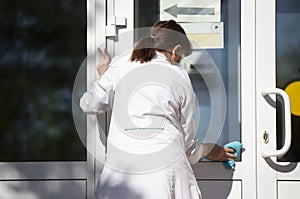 Cleaning lady in the hospital washes