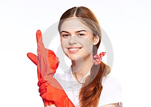 cleaning lady in red rubber gloves posing fun light background