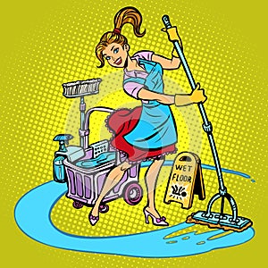 Cleaning lady washes the floor photo