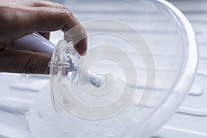 Cleaning latex nipple