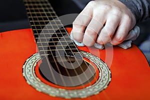 Cleaning musical instruments. acoustic guitar restorationn