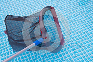 Cleaning net in pool