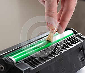 Cleaning printer toner cartridge