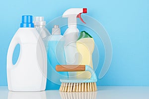 Cleaning product accessories on white table