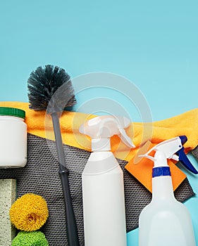 Cleaning products. Bottles, rubber gloves and sponge. Housework concept,