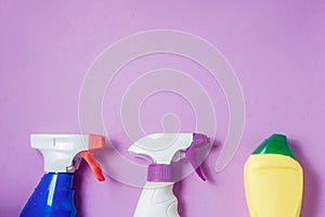 Cleaning Products. Home Cleaning Concept. Lilac Background. Place for Typography and Logo. Copy space. Flat Lay. Top