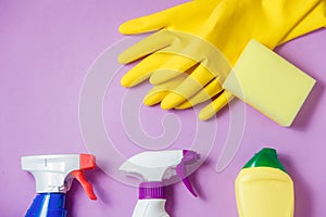 Cleaning Products. Home Cleaning Concept. Lilac Background. Place for Typography and Logo. Copy space. Flat Lay. Top
