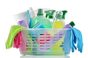 Cleaning products and supplies in a basket.