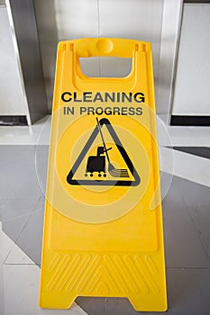 Cleaning in progress caution sign in office