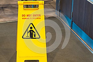 Cleaning in progress caution sign in pathways in the restaurant
