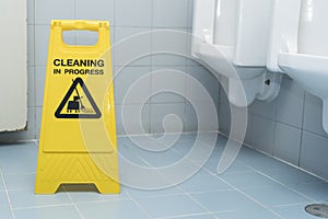 Cleaning progress caution sign in toilet