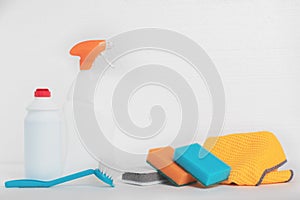 Cleaning after repair, facade cleaning. Bottles of sponges, rags, brushes and cleaning products for plumbing, sinks, bathtubs,