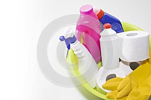 Cleaning and repair products, household chemicals, rubber gloves, green basin for cleaning the apartment and office