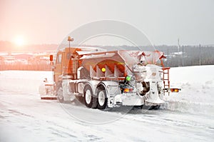 Cleaning the road from snow accumulations with specialized road equipment
