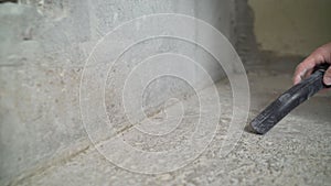 Cleaning service. dust removal with vacuum cleaner. Worker removes dust with a vacuum cleaner. Worker vacuuming the floor before