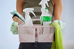 Cleaning service, product basket and cleaner hands for house work, office or home with plastic bottle, product and cloth