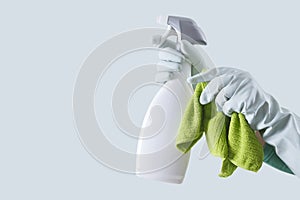 Cleaning service and solutions. Hands with gloves, green rags and spray bottle isolated on banner with copy space, search cleaning